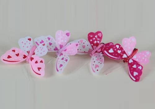 serie-12-farfalle-in-piuma-bicolore-con-clip-4-colori-assortiti-con-cuori