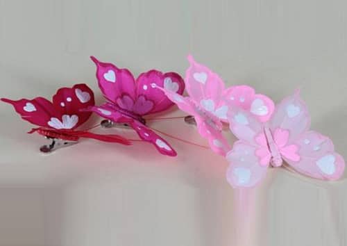 serie-12-farfalle-in-piuma-con-clip-4-colori-assortiti-con-cuori-tinta-unita